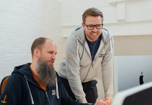 JumpCloud 5 crew members discussing work
