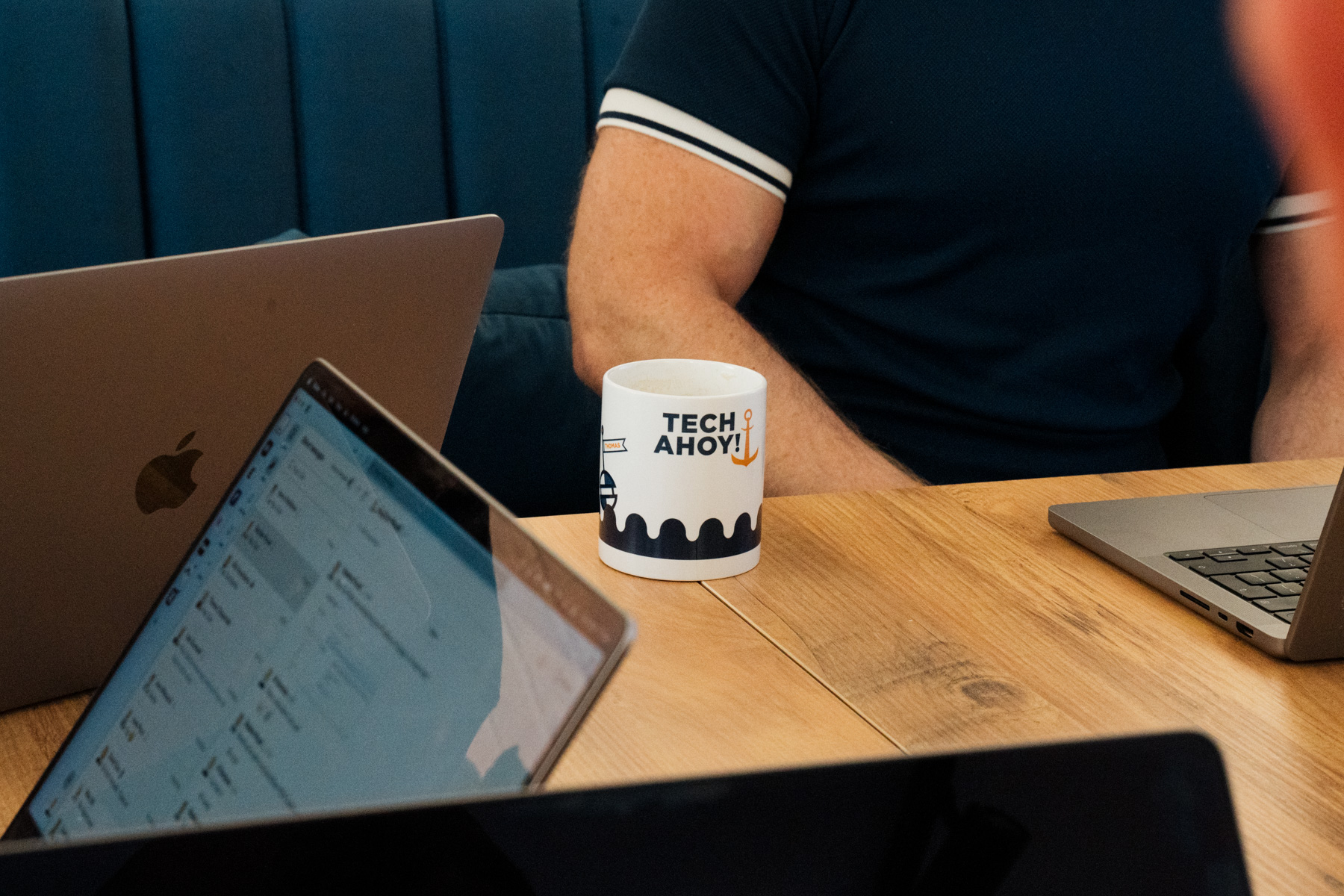 Terms of use 2 branded mug and laptops on desk pricing